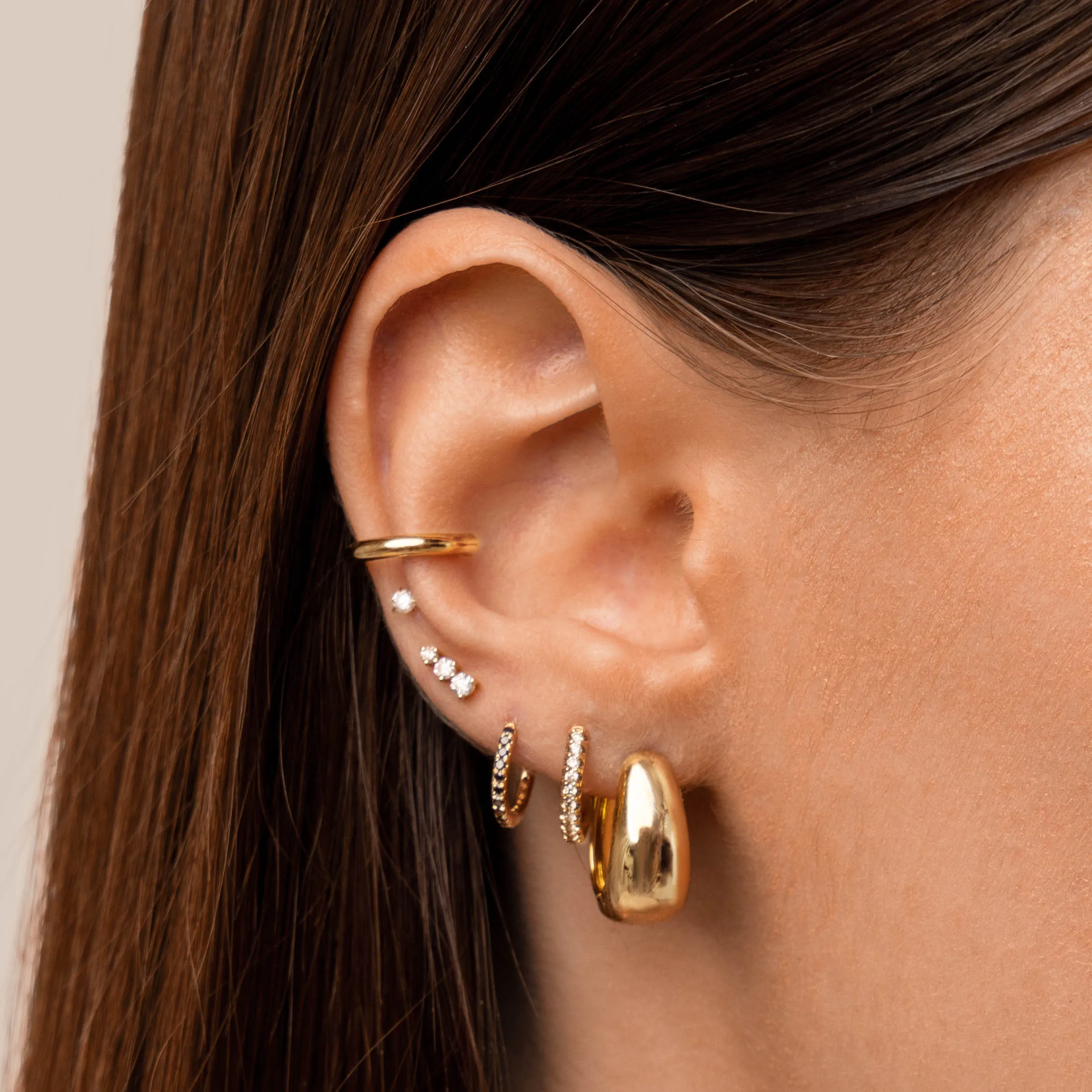 Dome Huggie Hoops in Gold