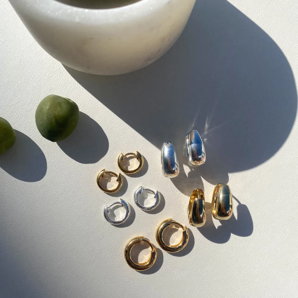 Dome Huggie Hoops in Gold